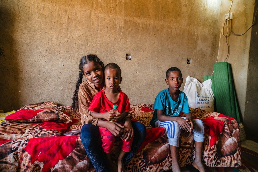 Abu Sufian's children in the small room the family shares in eastern Sudan, where they've found refuge. Photo: WFP/Abubakar Garelnabei